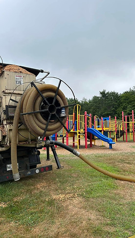 Hydroseeding hose at a playground